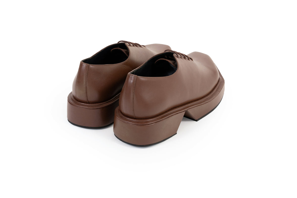 TRIANGLE BROWN
