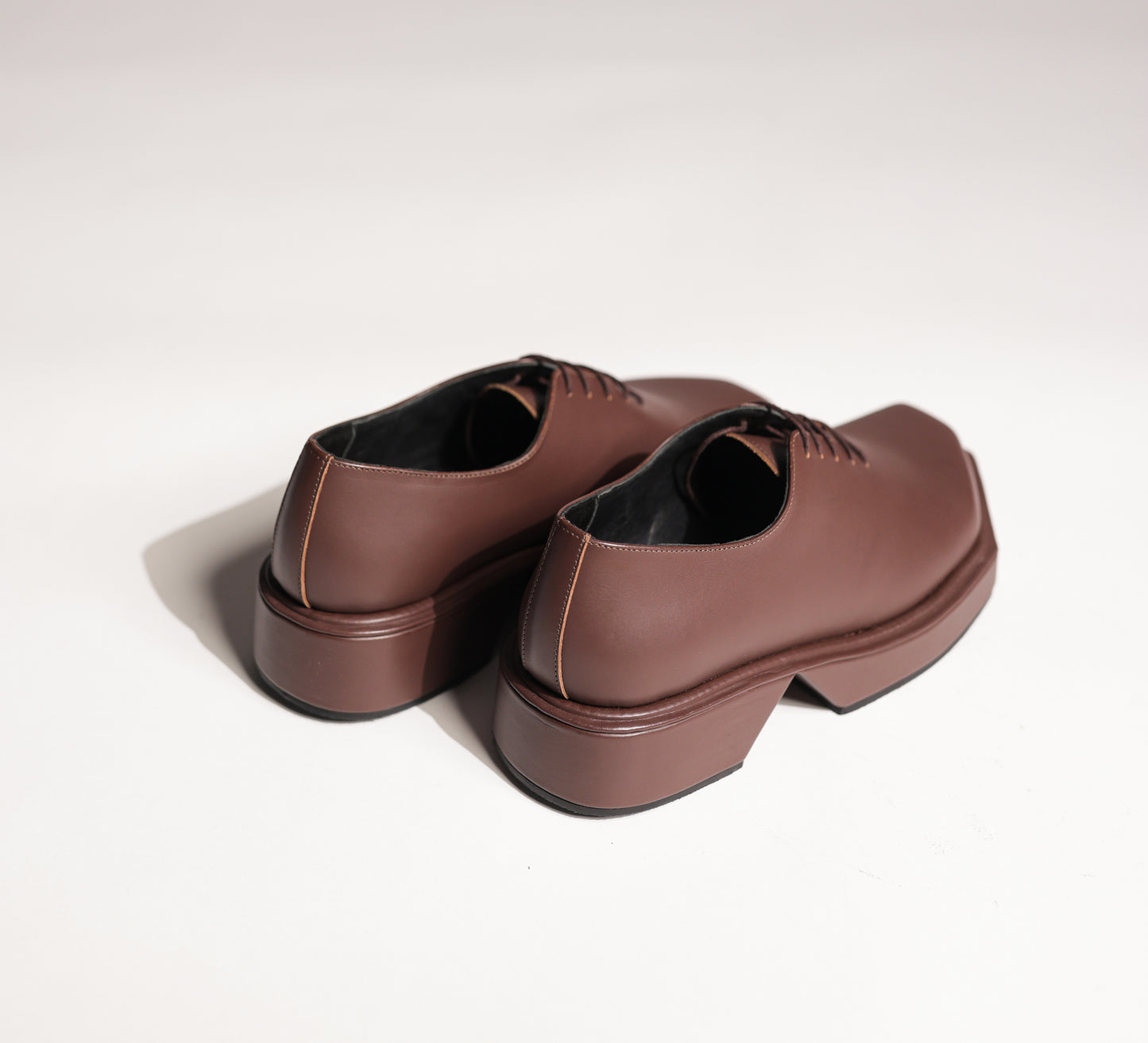 TRIANGLE BROWN