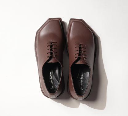 TRIANGLE BROWN
